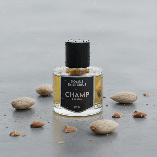 Champ on concrete with water droplets and almonds